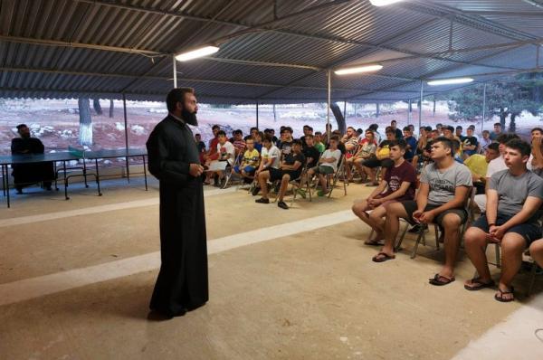 Την κατασκήνωση  της Ιεράς Μητροπόλεως στην Αίγινα επισκέφτηκε ο Πανοσ. Πρωτοσύγκελλος Αρχιμ.π. Νεκτάριος Δαρδανός